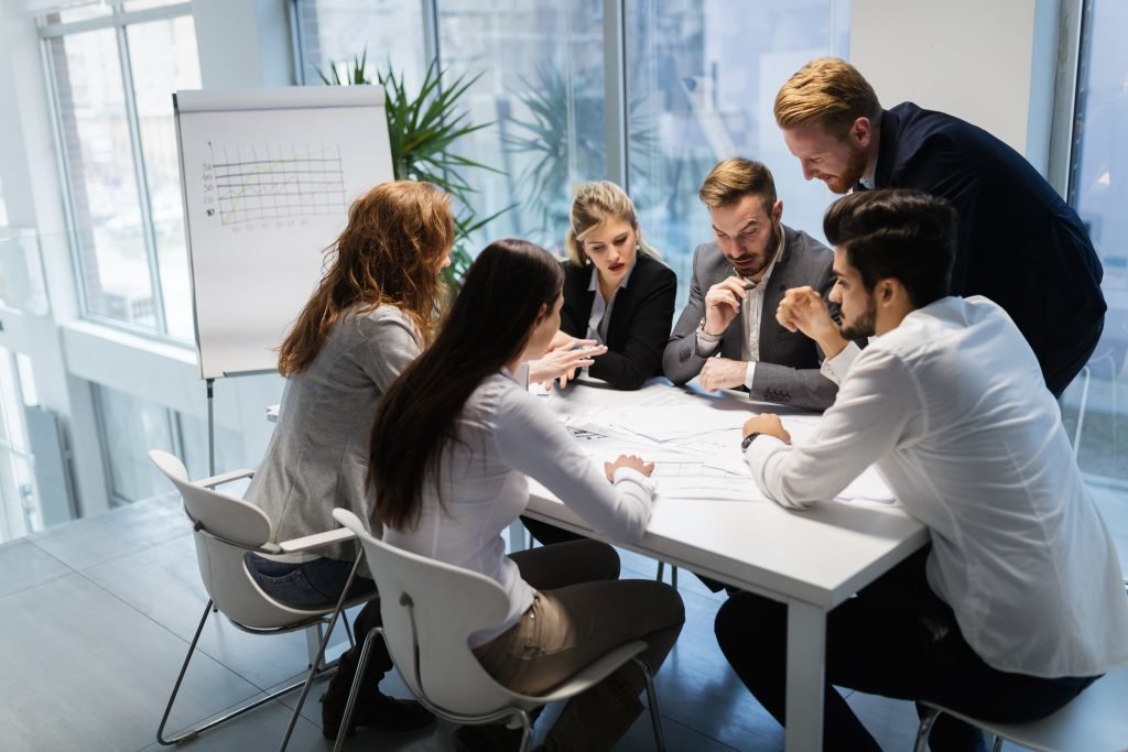 Portrait of architects having discussion in office